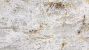 Cristallo Royal translucent quartzite slab from Brazil with white crystalline base and gold veins