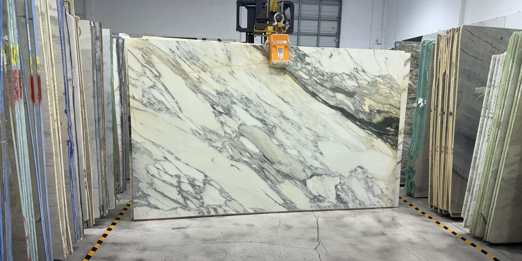 Arabescato Gold marble slab in the All Stones showroom in Doral